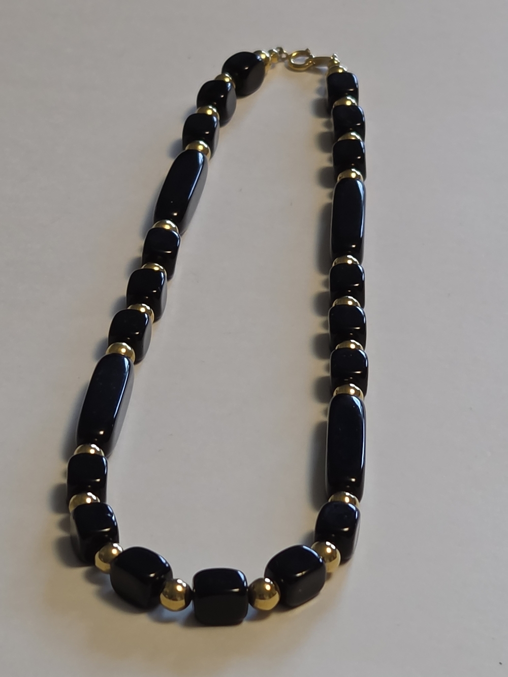 Vtg Trifari 18" Black Lucite Geometric Tube Necklace with Gold-Tone Spacer